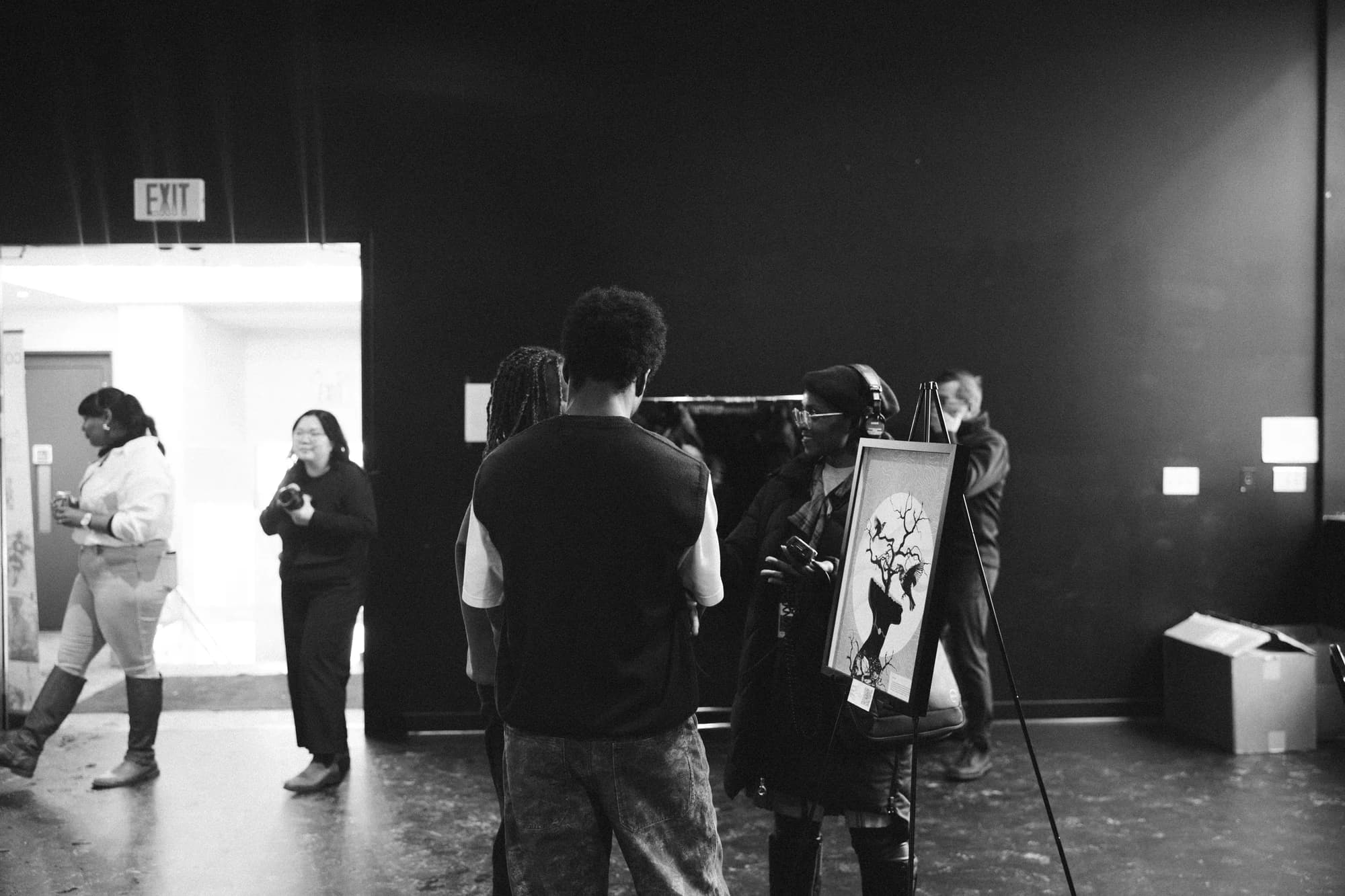 Visitors viewing the Community Champions exhibition