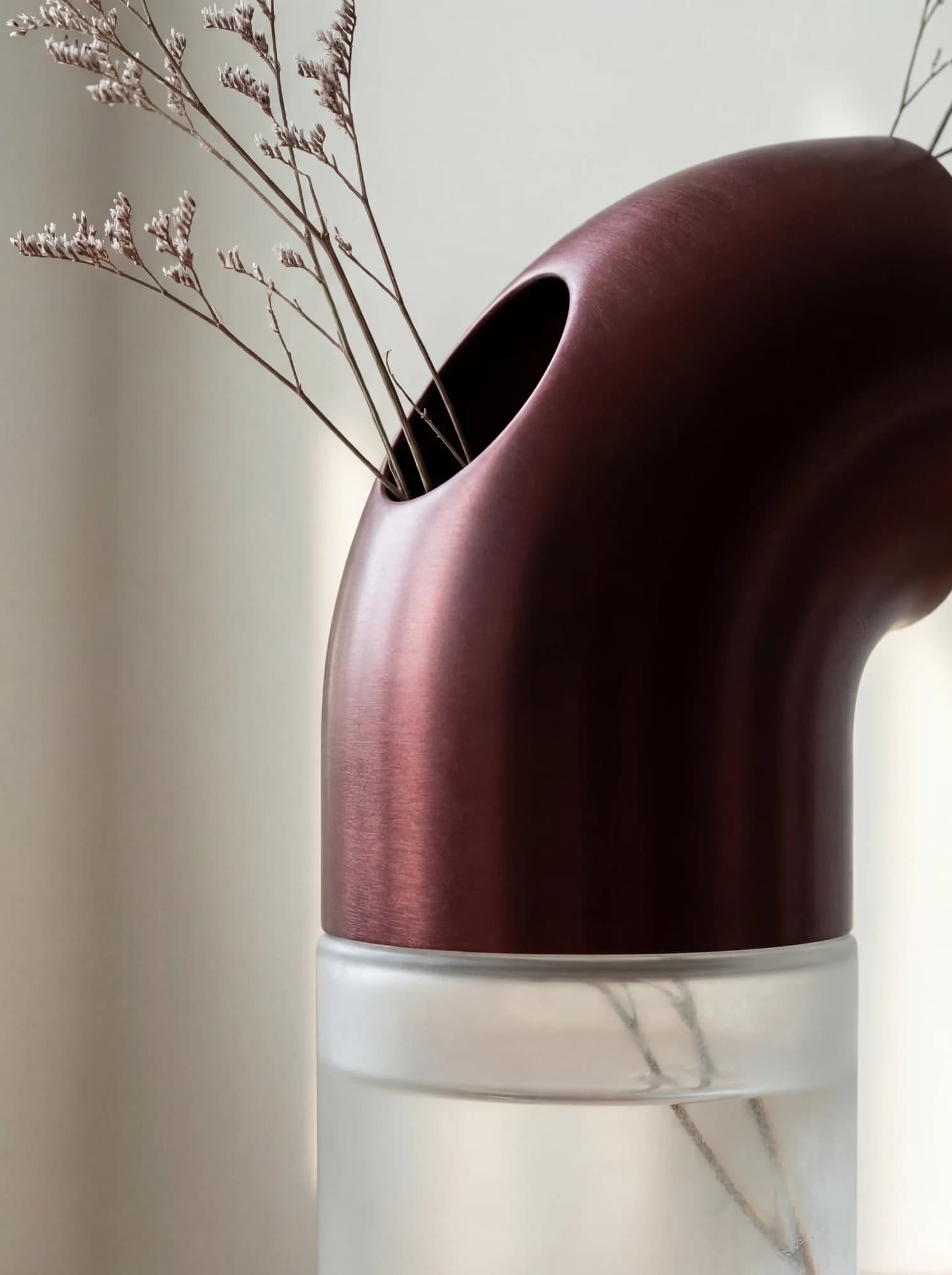 Close view of the vase opening and clear base